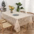 Detailed shot of light coffee lace embroidered tablecloth featuring delicate floral patterns. - 100*150 cm / Coffee - Rose