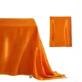 Orange satin tablecloth detail view, bright silk rectangular fabric for weddings and party decor. - Orange