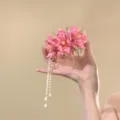 Pink flower hair clip with pearl tassels, exquisite design for beach vacation and daily wear. - Pink