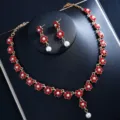 Elegantes rotes Zirkon Blumen Halskette und Ohrringe Set, ideal für Hochzeitsfeiern. - Rotes Set mit mehreren Blumen