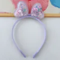 Detail shot of purple jelly heart bow headband with floating glitter and cute sequins inside. - Purple