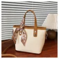Woven straw tote bag with brown PU trim, featuring a heart-patterned scarf handle variant. - Brown and White