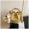 Yellow PU leather bucket bag with cute bear pendant, stylish shoulder and handbag. - With Pendant / Yellow