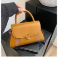 Stylish brown leather handbag with metal lock and woven detail, trendy top handle bag for women. - Brown
