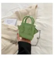 Green snake pattern mini handbag, trendy crossbody bag with chain strap for women. - Green