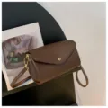 Stylish brown cylindrical shoulder bag, minimalist casual crossbody bag for women. - Coffee