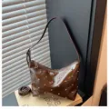 Brown patent leather rivet shoulder bag for women, stylish underarm casual crossbody bag. - Coffee