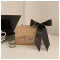 Beige quilted chain shoulder bag with elegant black bow, chic daily crossbody bag for women. - Khaki