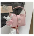 Chic sac à main rose motif litchi pour femmes, élégant sac porté épaule et bandoulière. - Rose Avec Pendentif