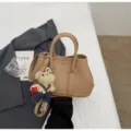 Stunning large capacity women shoulder handbag with cute bear charm for daily fashion use - With Pendant / Khaki