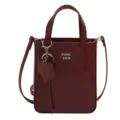 Burgundy patent leather mini crossbody bag, trendy small tote with heart charm detail. - Burgundy