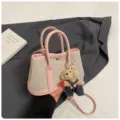 Pink canvas leather tote bag with cute bear pendant, stylish shoulder crossbody bag for women. - With Charm / Pink