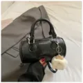 Black cylinder shoulder bag stylish pillow bag with cute fluffy plush charm pendant daily fashion. - With Pendant / Black