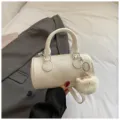 White cylindrical handbag pillow bag with plush charm and shoulder strap for women fashion style. - With Pendant / White
