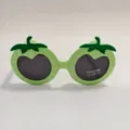 Kids cute cartoon strawberry sunglasses with polarized UV400 protection green frames. - Green