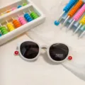 Cute baby polarized sunglasses with candy color frames, ideal for summer sun protection. - White