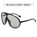 Occhiali da sole eleganti e grandi con montatura nera e lenti grigio chiaro per sport. - Nero Lucido Gris Chiaro