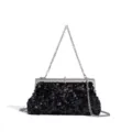 Detailed view of the elegant black sequin evening clutch bag with silver chain strap and frame. - Black