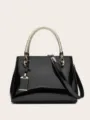 Bolso de mano de charol negro con asa trenzada dorada, elegante y versátil bolso diario. - Negro