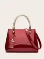 Red patent leather handbag with metallic braided handle, stylish tote bag for women. - Burgundy