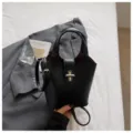 Classic black leather bucket bag for women, stylish crossbody handbag for daily commute. - No Pendant / Black