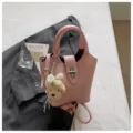 Chic pink bucket bag for women, stylish leather handbag with cute puppy pendant, large capacity. - With Pendant / Pink
