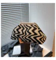 Black and white wavy knit clutch bag, stylish everyday dumpling shoulder bag with chain. - White