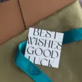 Detailed shot of modern minimalist greeting card featuring stylish typography on gift packaging. - 8*8cm 50 Pieces