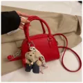 Red litchi grain PU leather shell crossbody bag with cute bear pendant, stylish daily purse. - With Pendant / Red