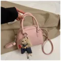 Chic pink pebble leather dome handbag for women, cute bear charm crossbody bag stylish daily. - With Pendant / Pink