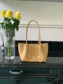 Luxury woven shoulder bag in soft cream yellow with heart pendant, large capacity daily tote. - Yellow Woven Bag