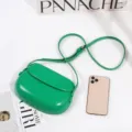 Green leather saddle bag, stylish women crossbody shoulder bag with long adjustable strap for daily use. - Green