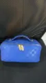 Blue PU leather cosmetic bag with checkered pattern, gold zippers and handle for travel use. - 25x12x12cm / Blue Makeup Bag