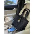 Black quilted puffer tote bag with plush charm, ideal for autumn and winter daily commute. - Black