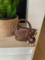 Brown PU leather small handbag with top handle, flap closure and cute plush monster pendant. - With Charm / 18x10x13cm / Brown