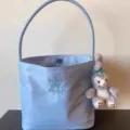 Korean style nylon underarm bag, cute embroidered lavender handbag with plush keychain detail. - Blue