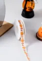 Halloween printed cotton ribbon detail shot showing cute pumpkin and leaf patterns on spool. - 15mm Pumpkin Tree Halloween Ribbon 10 Yards