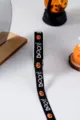 Close-up detail shot of Halloween printed cotton ribbon featuring spooky boo and pumpkin prints. - 15mm BOO Black Halloween Ribbon 10 Yards