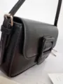 Chic black shoulder bag with stylish square buckle minimalist design for women daily wear. - Black