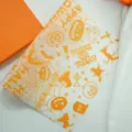 Halloween durchsichtiges Backpapier Wachspapier fettdicht Lebensmittelverpackung Blatt 22x25cm - Orange Packung