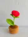 Handcrafted crochet rose flower pot detail shot, perfect for cute home desk or car interior decor. - Red