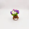 Handmade crochet potted plant, cute purple and white flowers with smiling brown pot variant. - Gradient