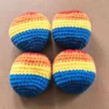 Handgefertigte Häkel-Garnbälle für Kinderspielzeug, bunte gestreifte Strickspielbälle, 4er-Pack. - Gemustert