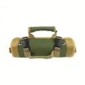 Détail en gros plan d'une trousse à outils en tissu Oxford avec boucles robustes. - Vert