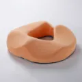 Ergonomic anti-bedsore cushion for elderly patient care, breathable pressure relief medical pillow. - Hemorrhoid Cushion / Orange