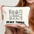 Canvas zipper pouch close up showing cute baking theme line art and text design. - Creative Baking Illustration Style (18)