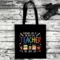 Black canvas tote bag with colorful teacher letter print, casual eco-friendly shoulder bag. - Style 19