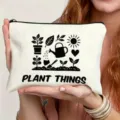 Minimalist black and white line art canvas zipper pouch, versatile daily storage makeup bag. - Gardening Illustration Style (17)