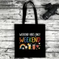 Black canvas tote bag with weekend vibes print, casual shoulder bag for daily use. - Style 18