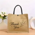 Vintage Jute Tragetasche mit Pflanzenmuster, große wiederverwendbare Jutetasche mit Henkeln. - Botanischer Druck Stil Neunzehn
